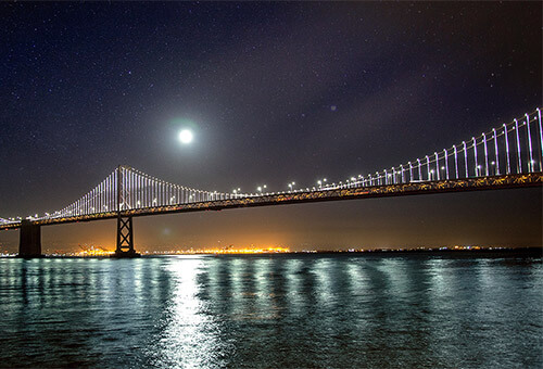 Golden Gate Bridge bathed in moonlight