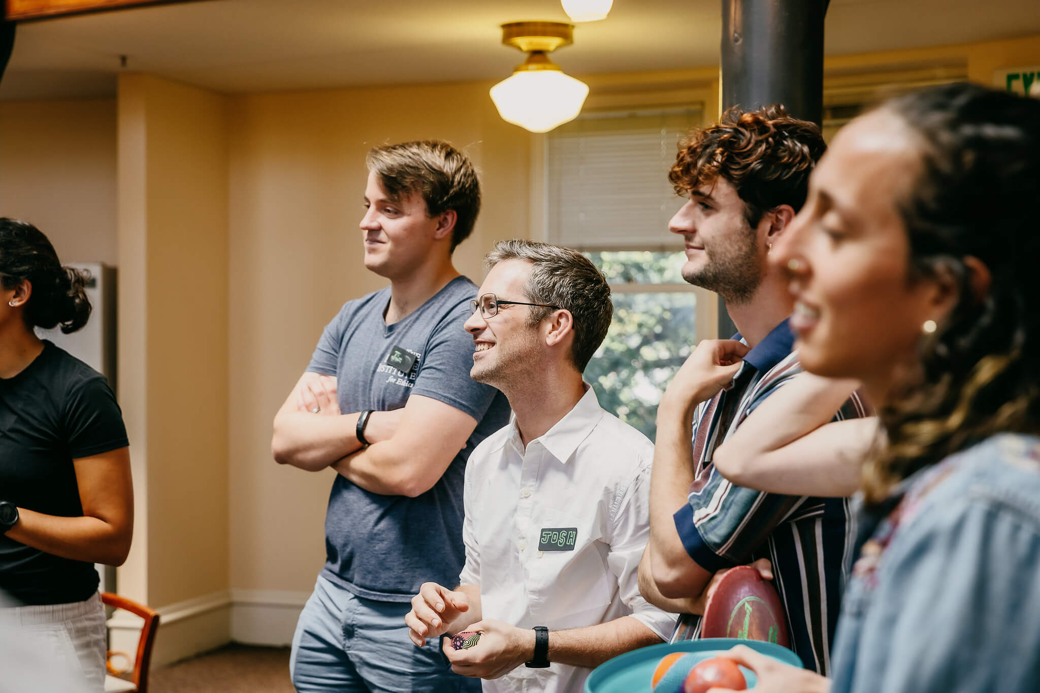 men and woman conducting classroom activity