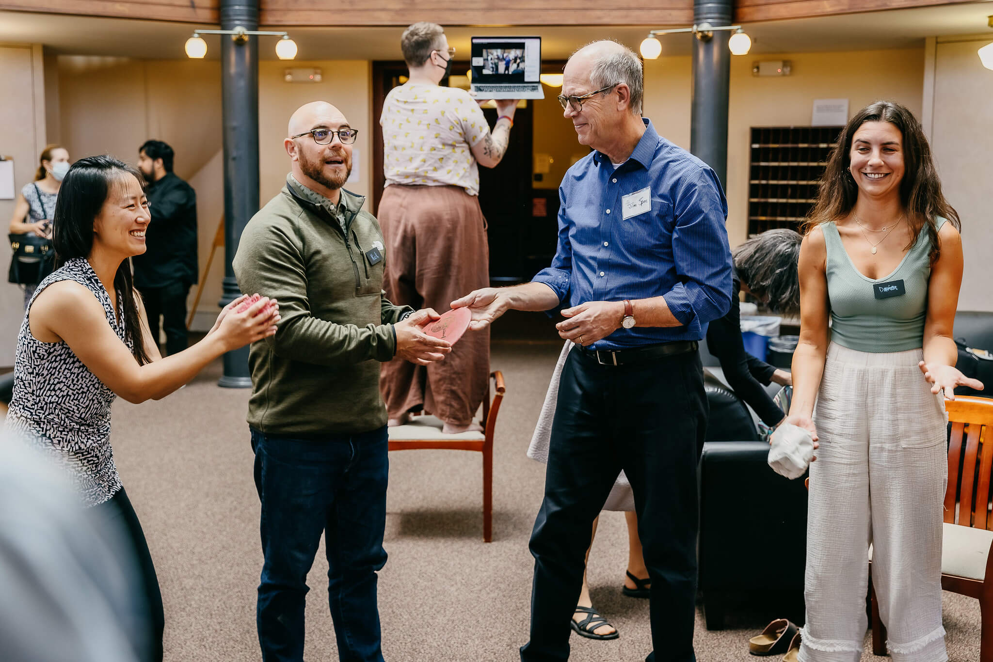 group of men and women engaged in sustainability activity